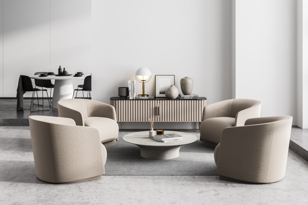 Curved chairs with circular coffee table in living room