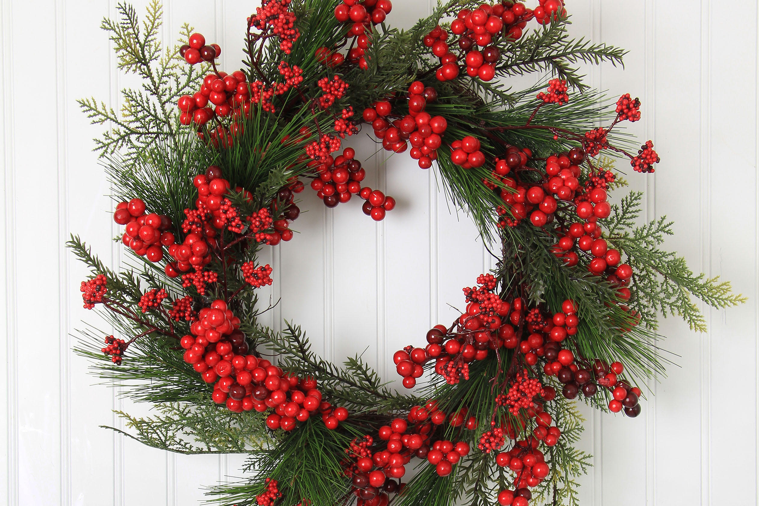 Evergreen wreath with red berries
