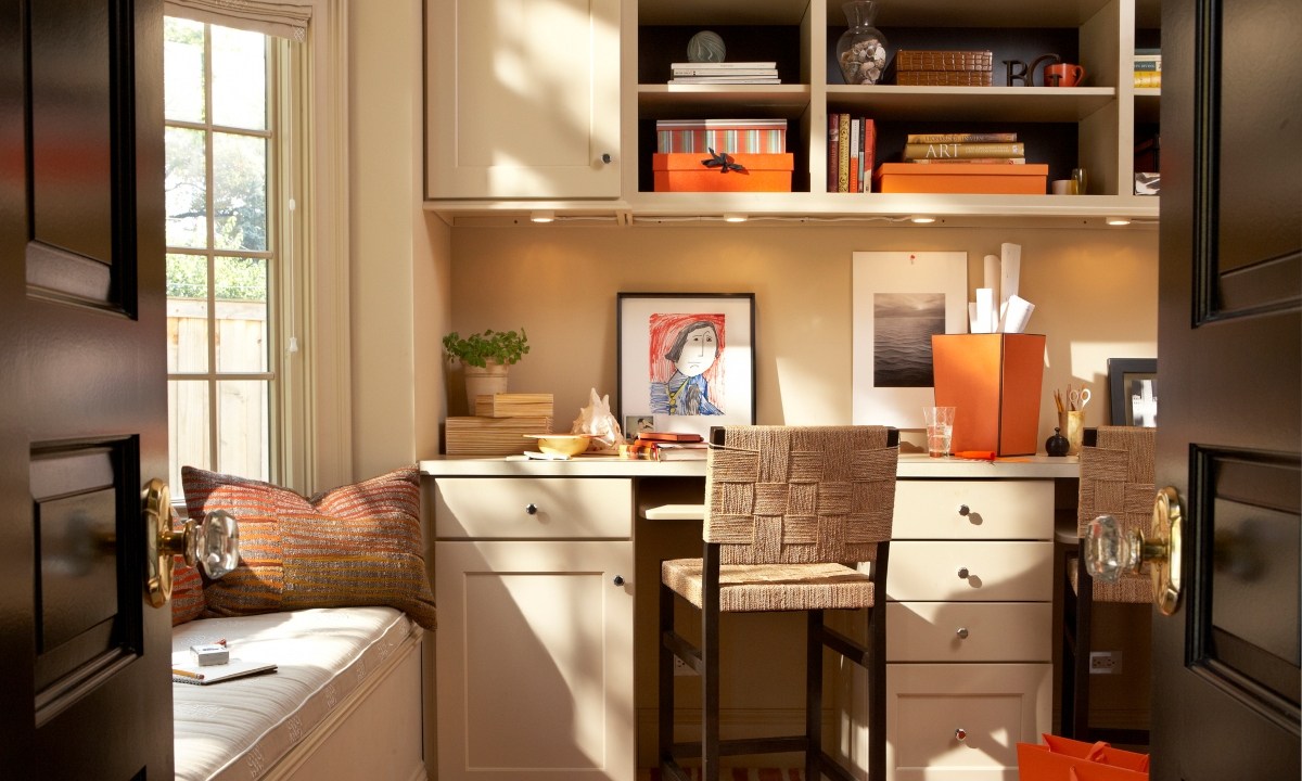tiny home office space with open shelving and plenty of storage