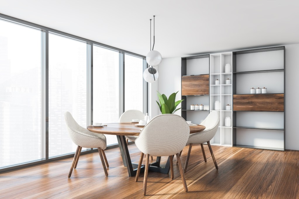 modern dining room with round chairs and table