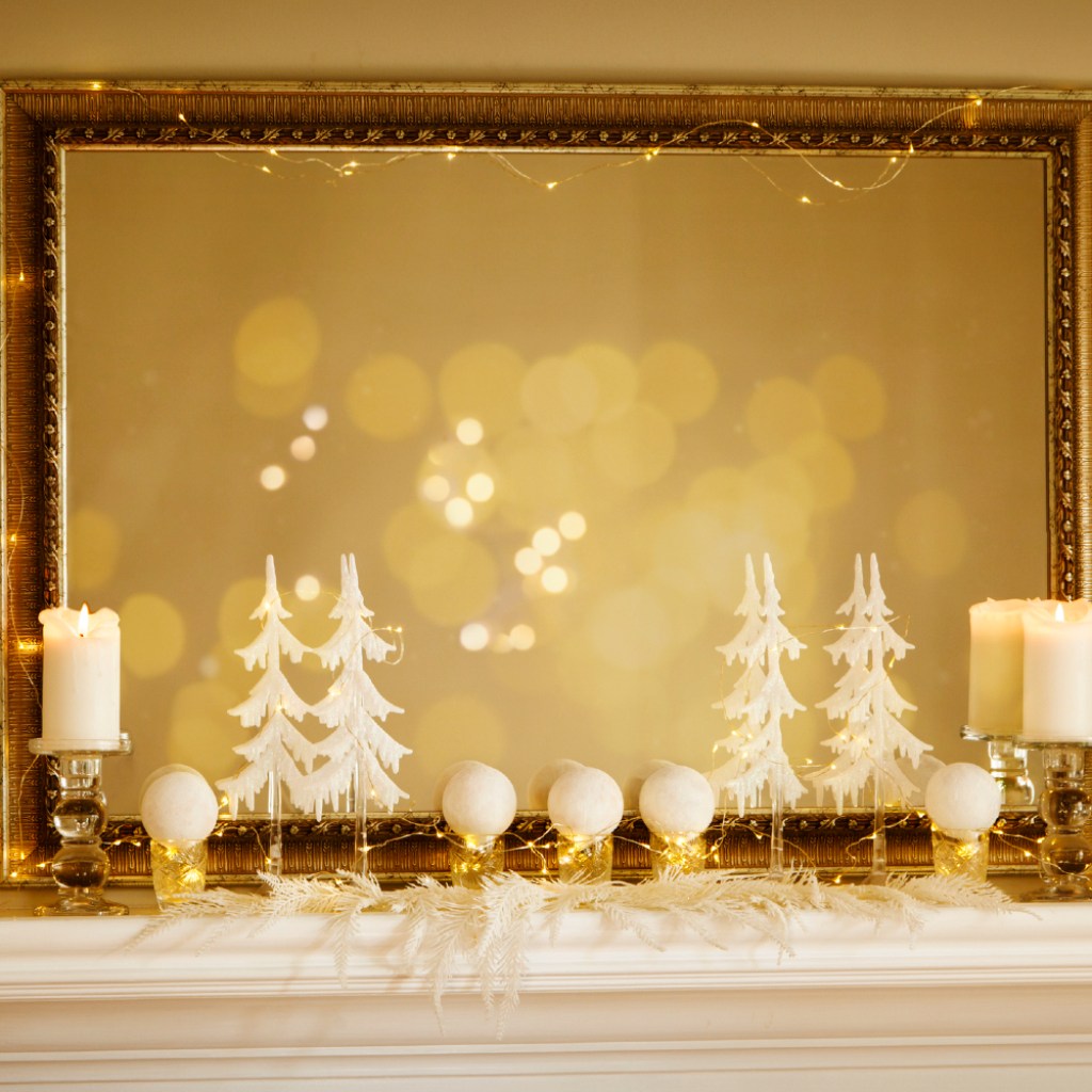 All-white Christmas display mantle
