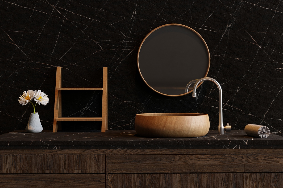 Dark black bathroom wall color with natural decor