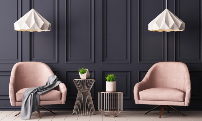 dark grey textured walls home design with pink chairs