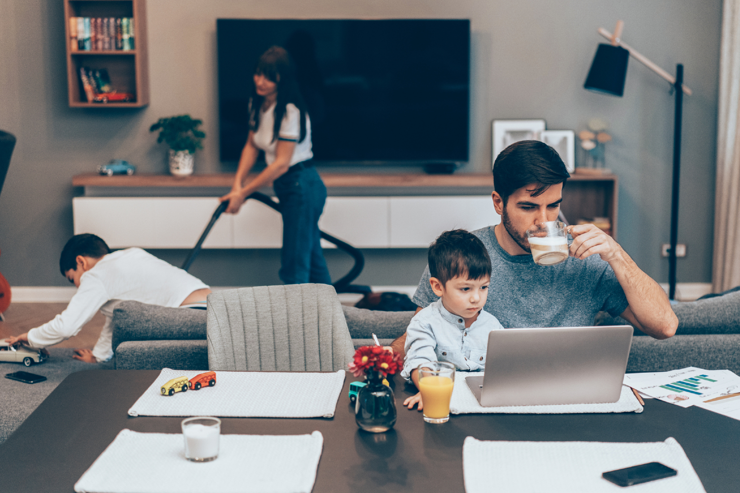 Family in home with open floorplan.