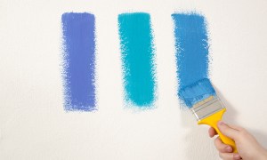 Blue paint samples on a white wall