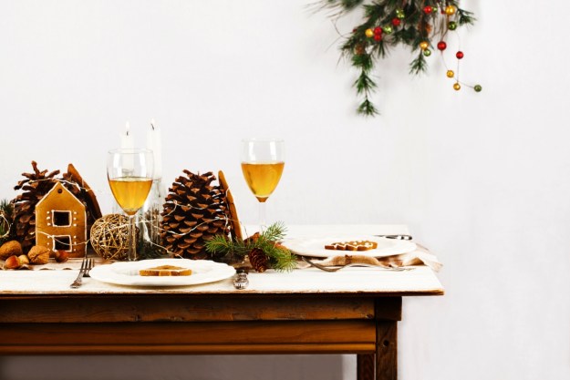 White background with Christmas garland and winter decor