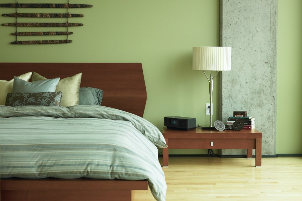Pale green bedroom walls.