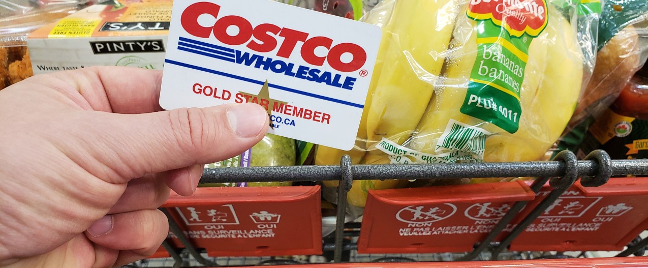 Person grocery shopping with a Costco membership