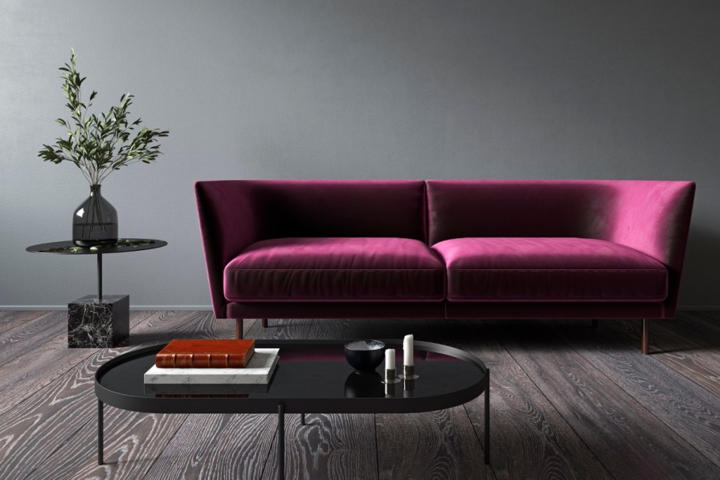 Purple jewel toned couch in modern living room design