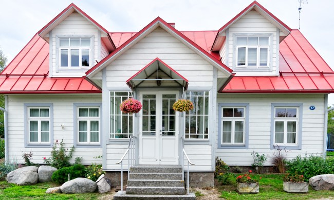 White Cape Cod-style house with a red roof
