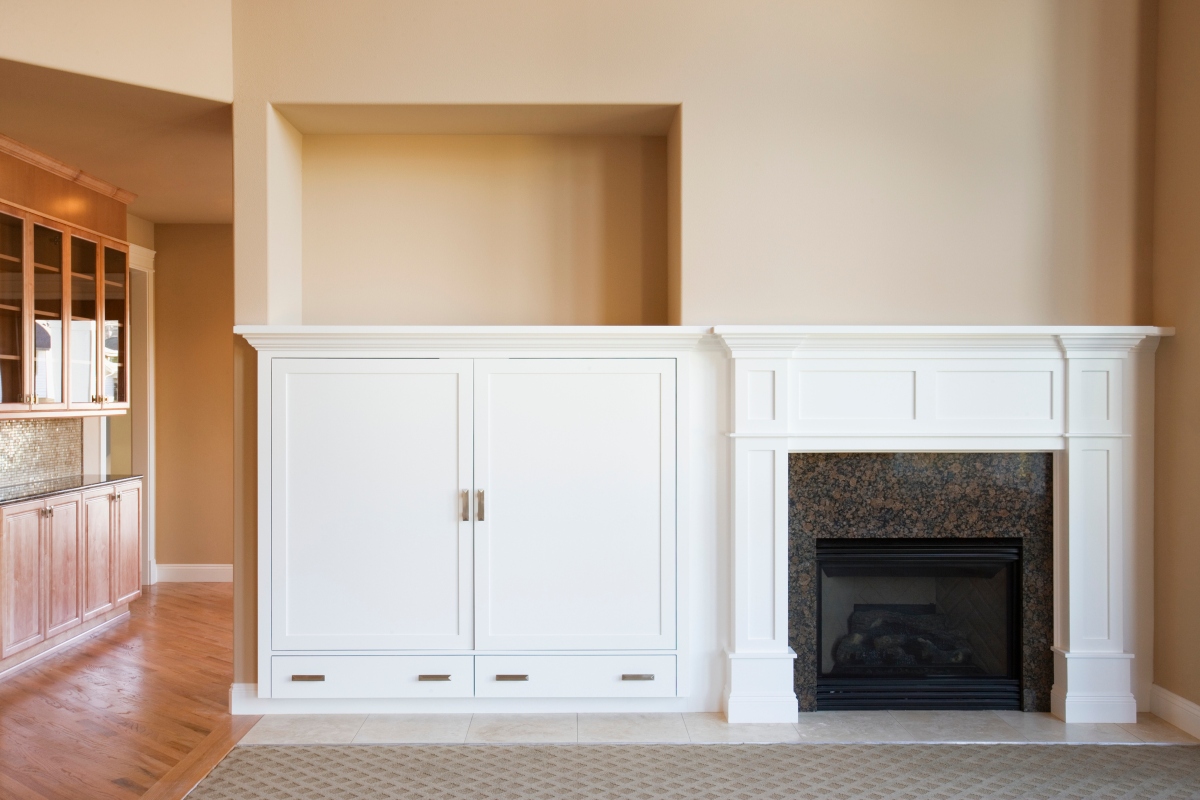 painted beige wall with fireplace in living room
