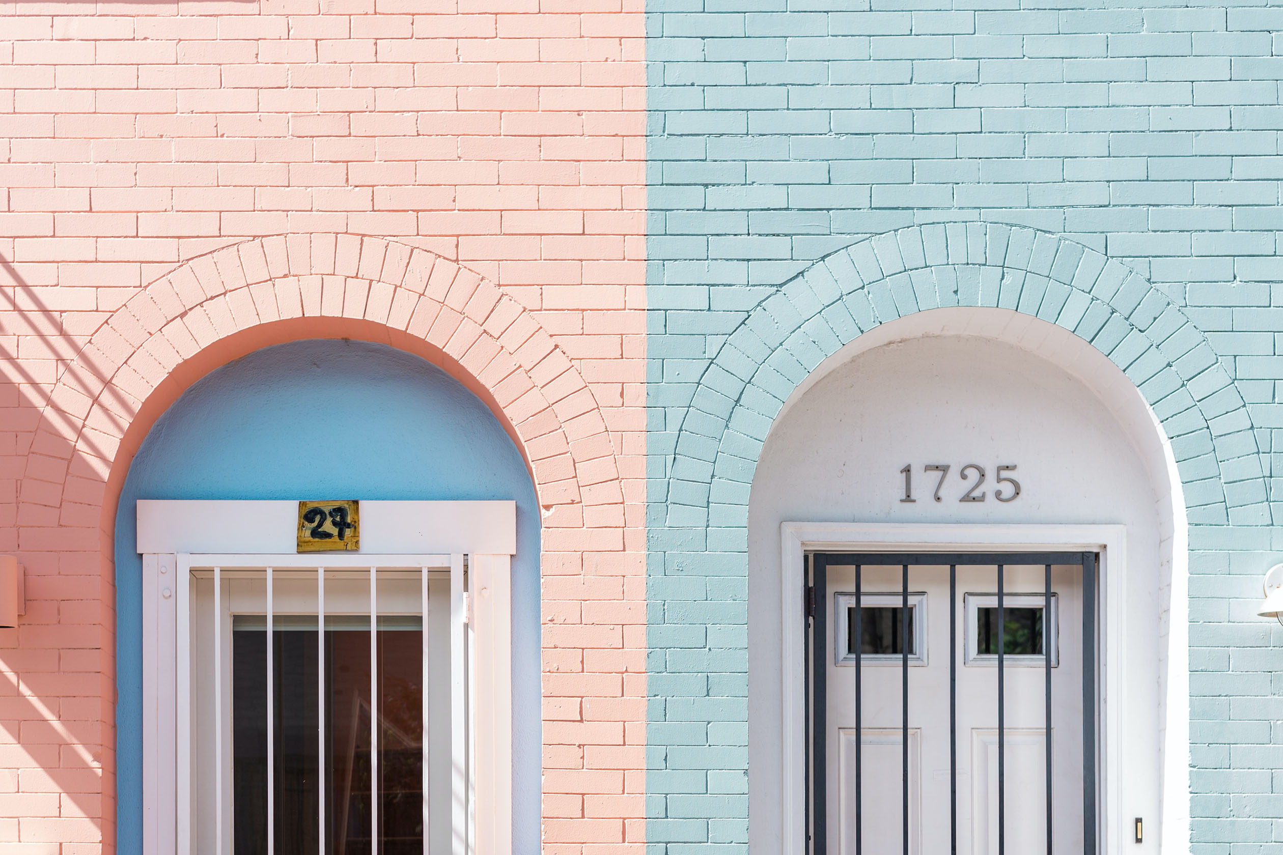 Brick doorways painted with pastels