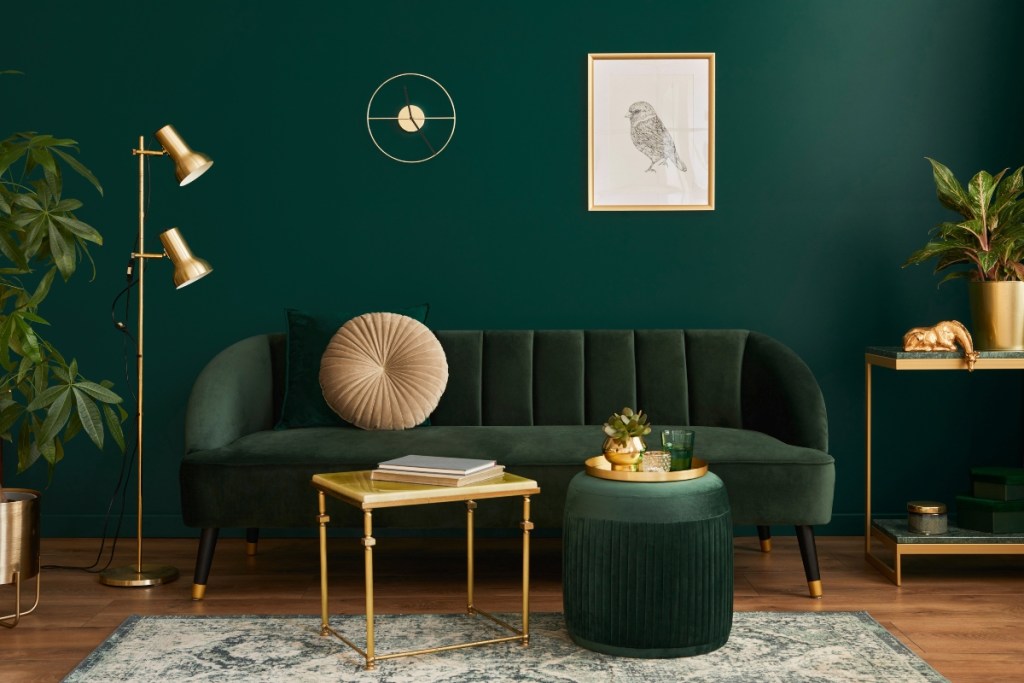 Dark green monochrome color palette for living room design