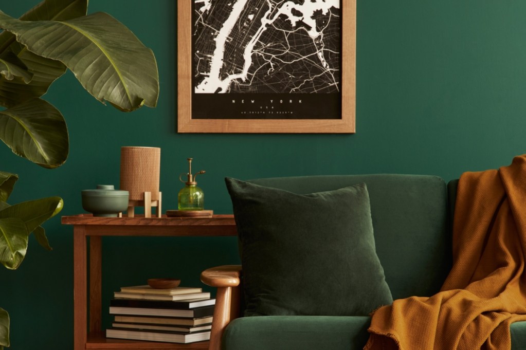 dark green wall color with retro furniture