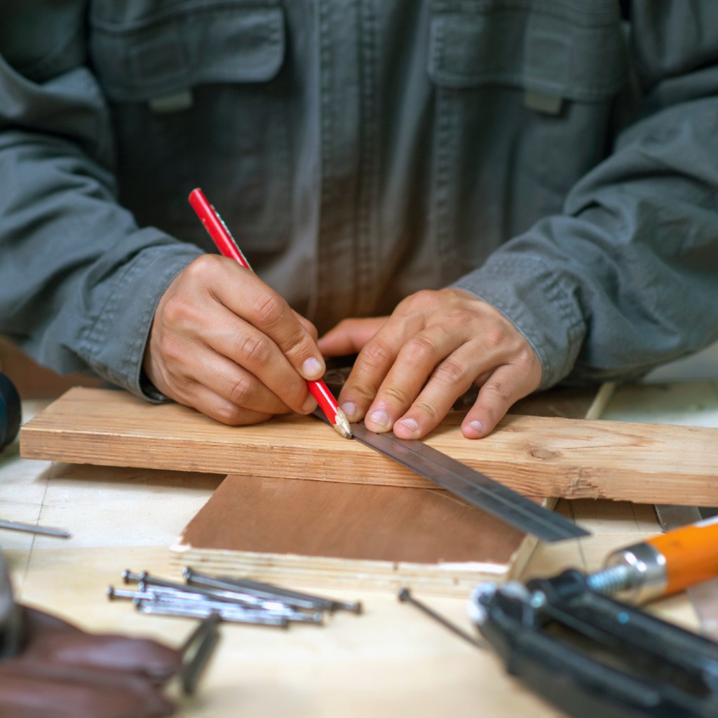 Man building a deck.