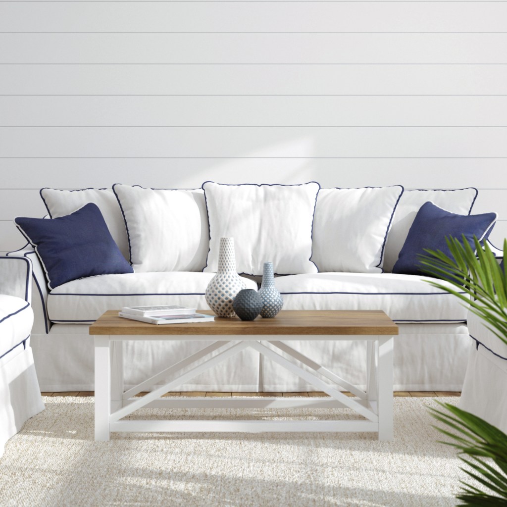 Modern coastal living room with blue and white wicker