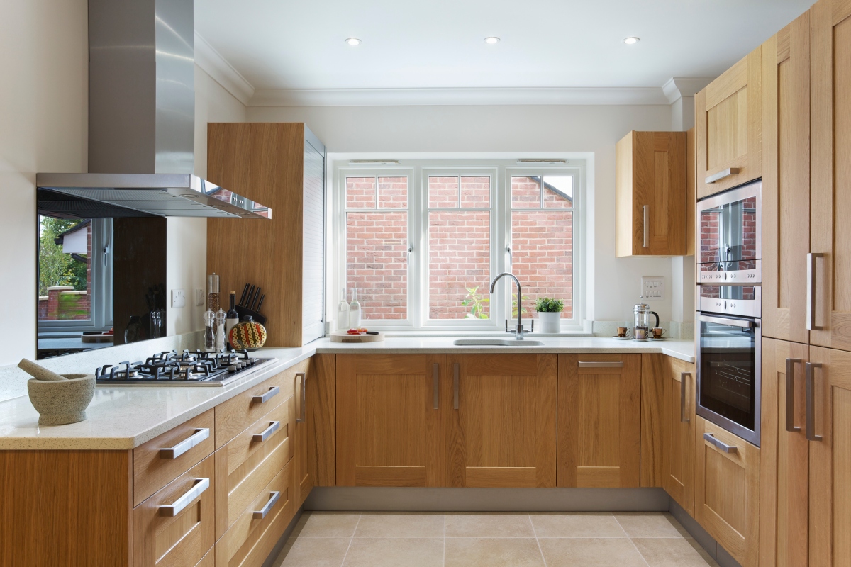 Oak cabinets in a small apartment kitchen