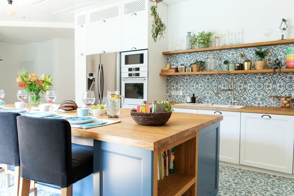 rustic mediterranean kitchen design with blue tile backsplash