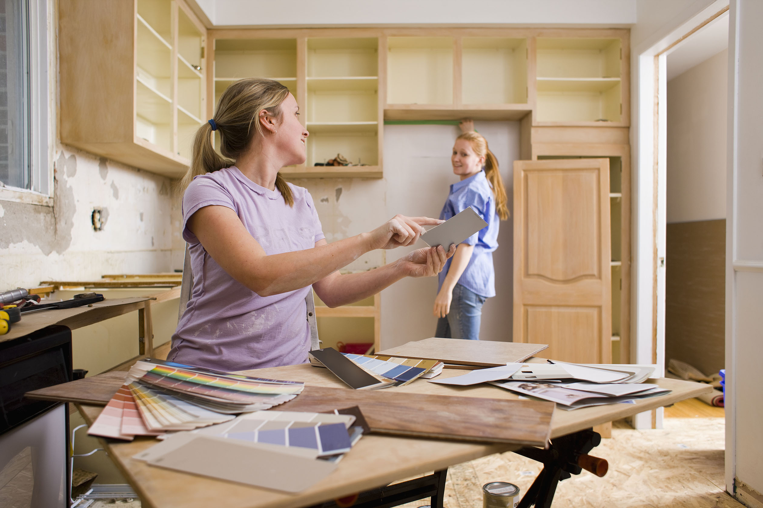 Two women planning a kitchen renovation