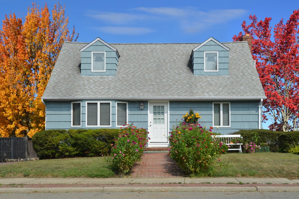 Blue cape cod house