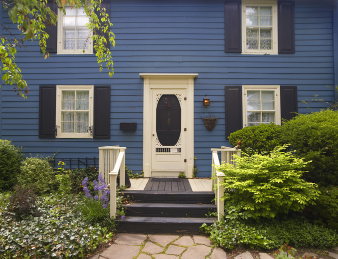 Deep blue house with two floors