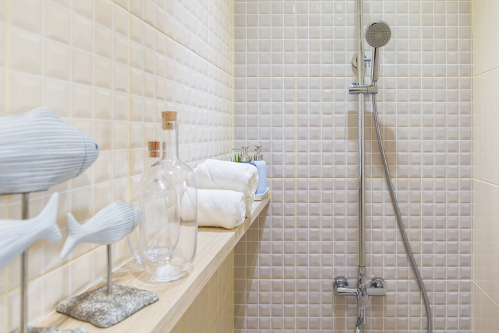 Bathroom with white tile and shower