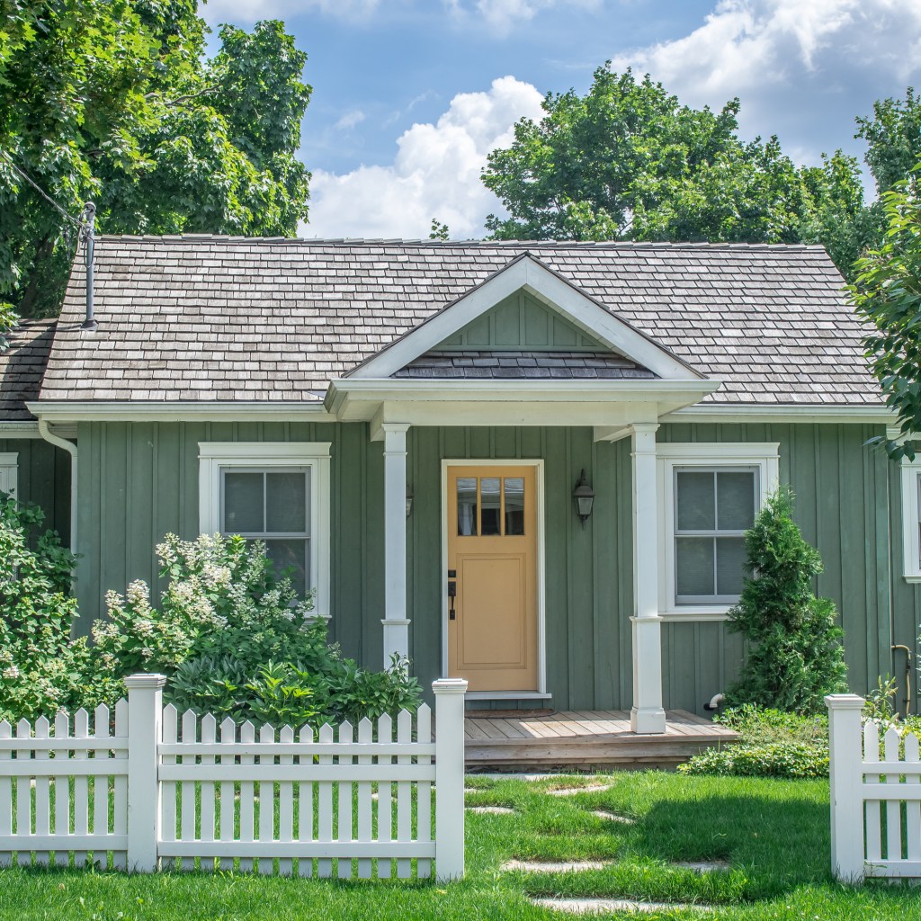 Green cottage style home