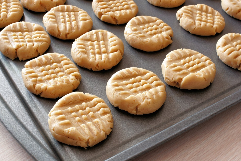 Homemade peanut butter cookies on a baking sheet
