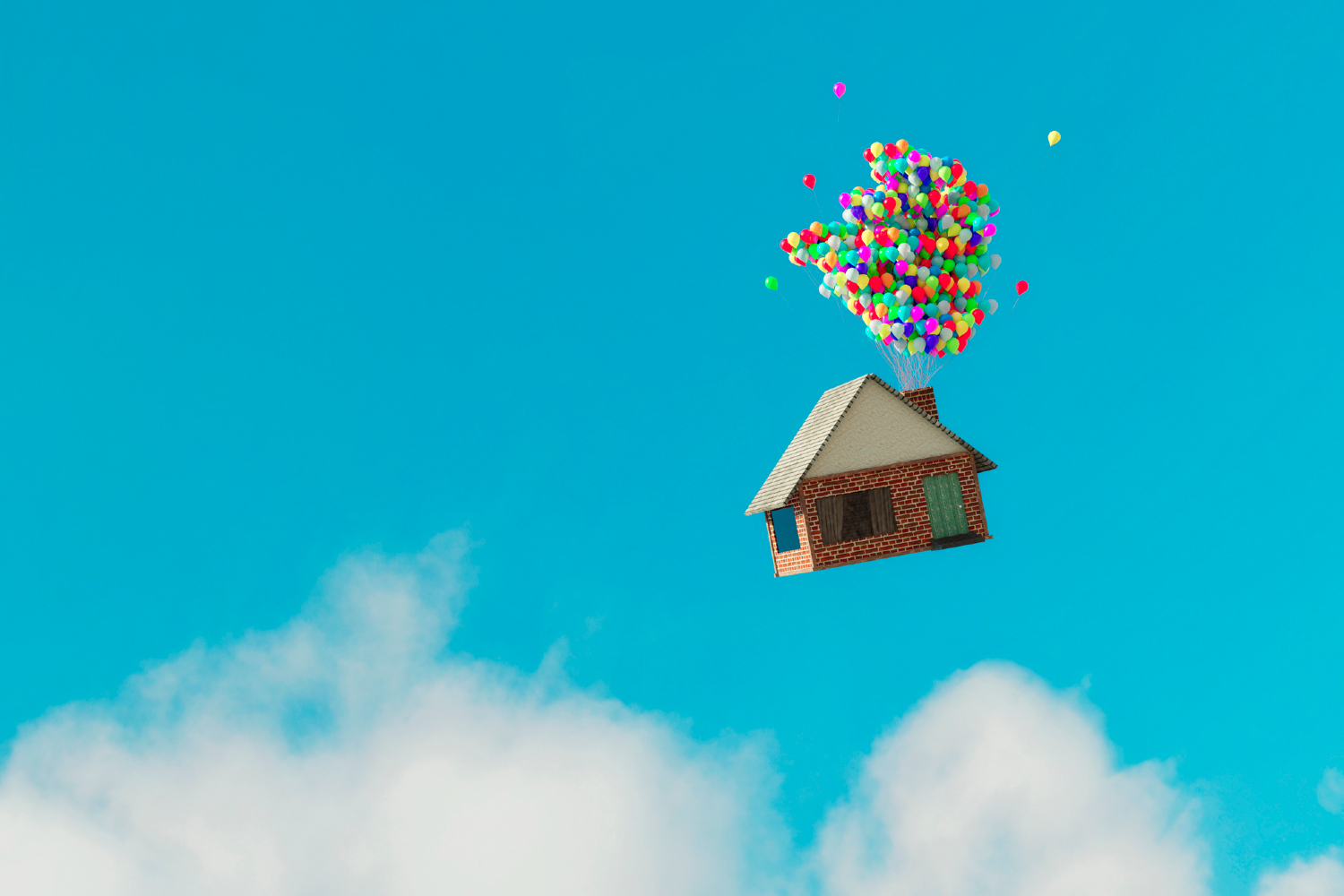 House being carried away by a bunch of balloons.