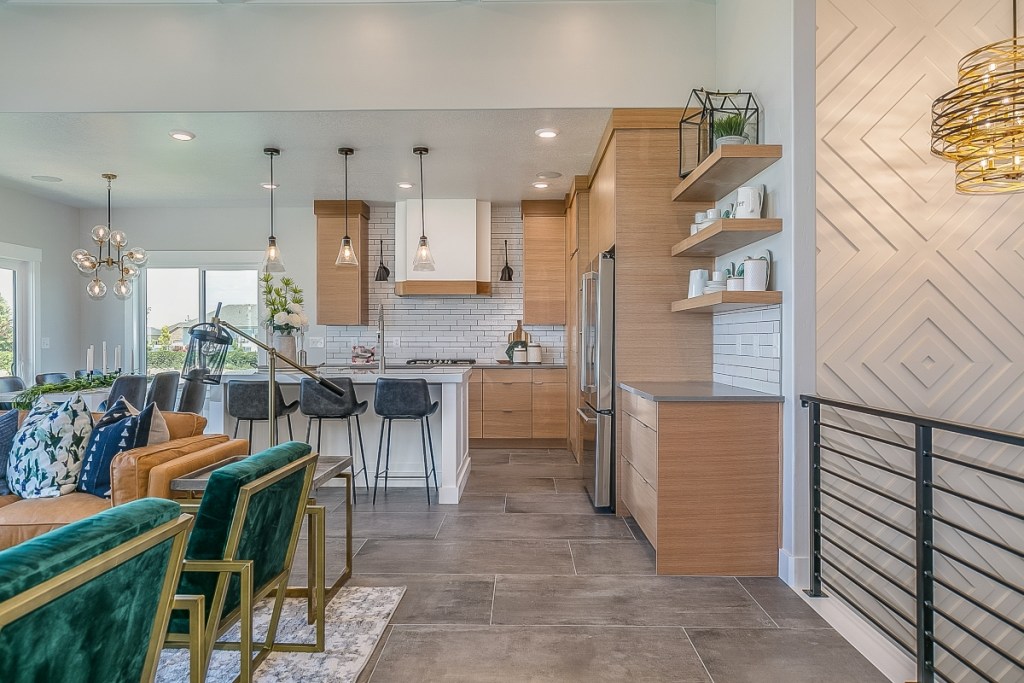 Midcentury modern kitchen with wood cabinets and pendant lighting