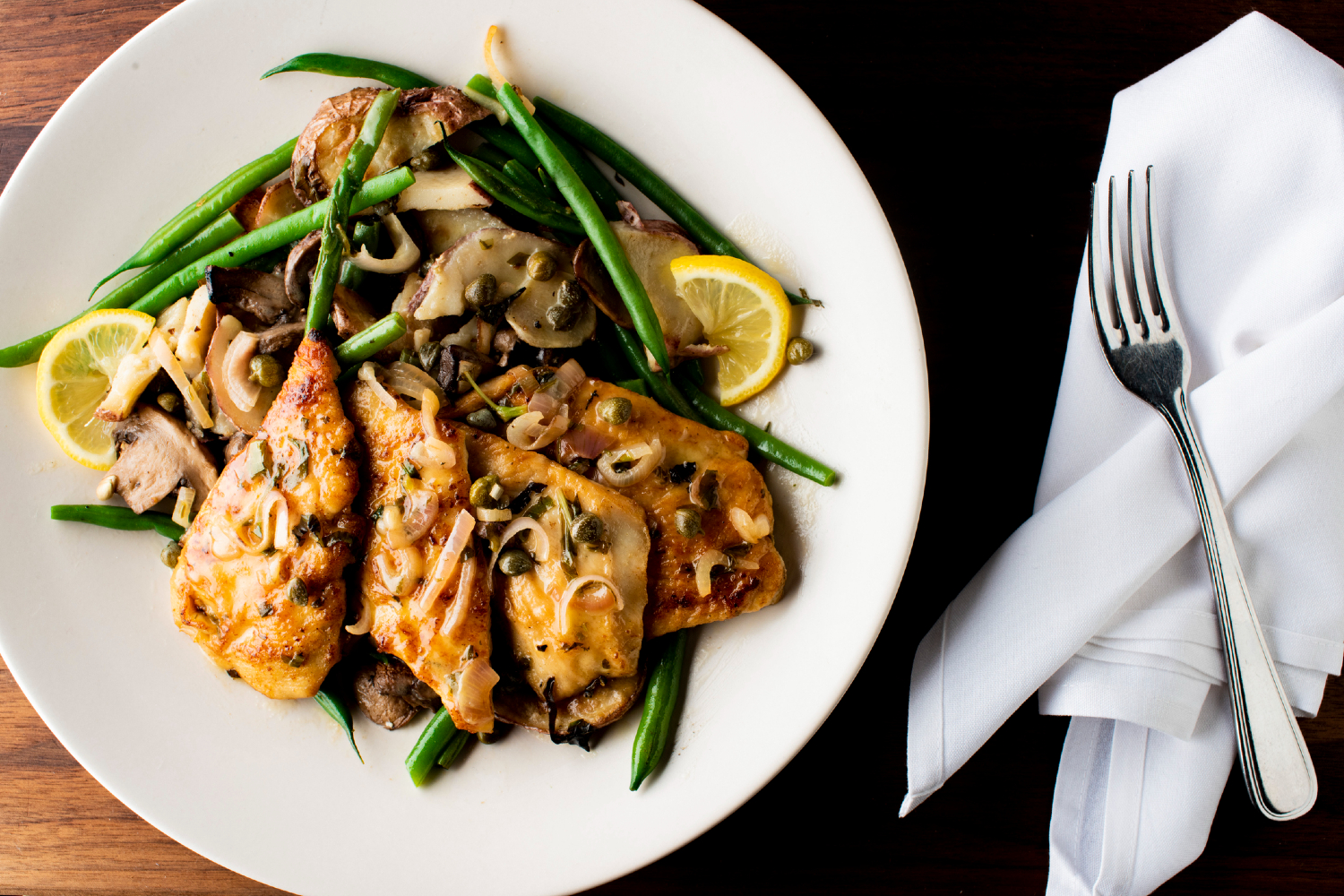 Overhead of Chicken Piccata meal.