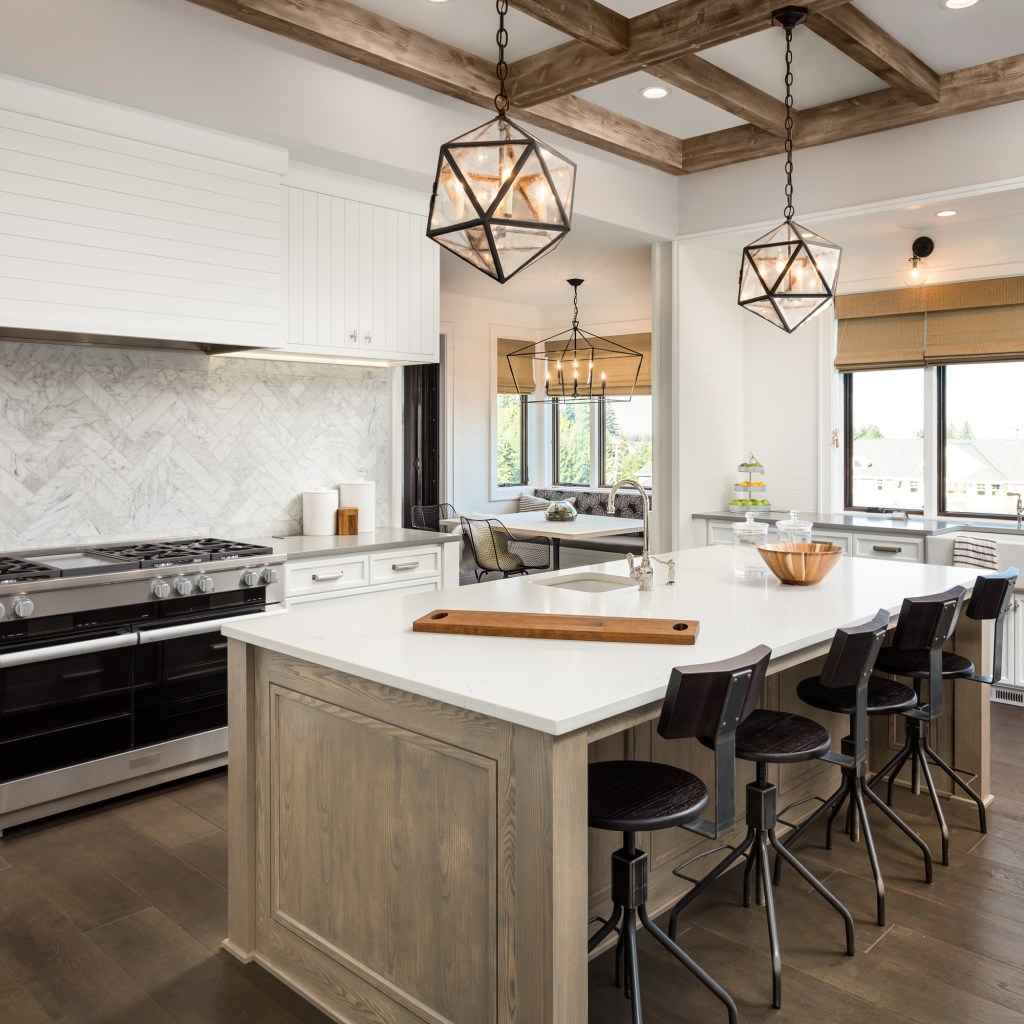 Rustic farmhouse kitchen with white quartz countertops