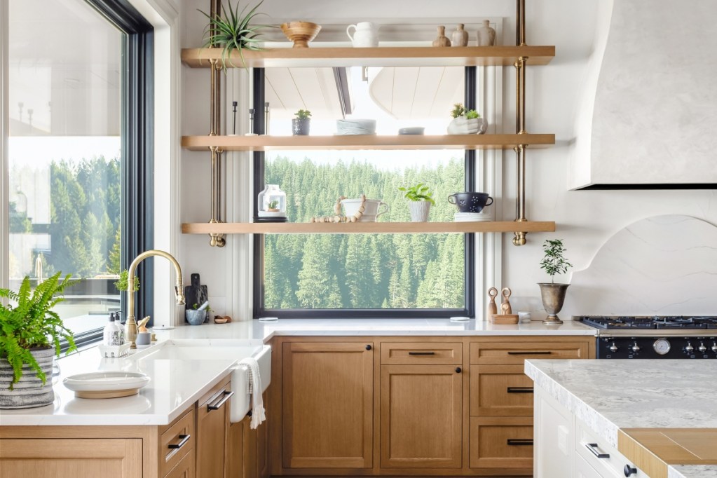 farmhouse style kitchen with open windows and shelving