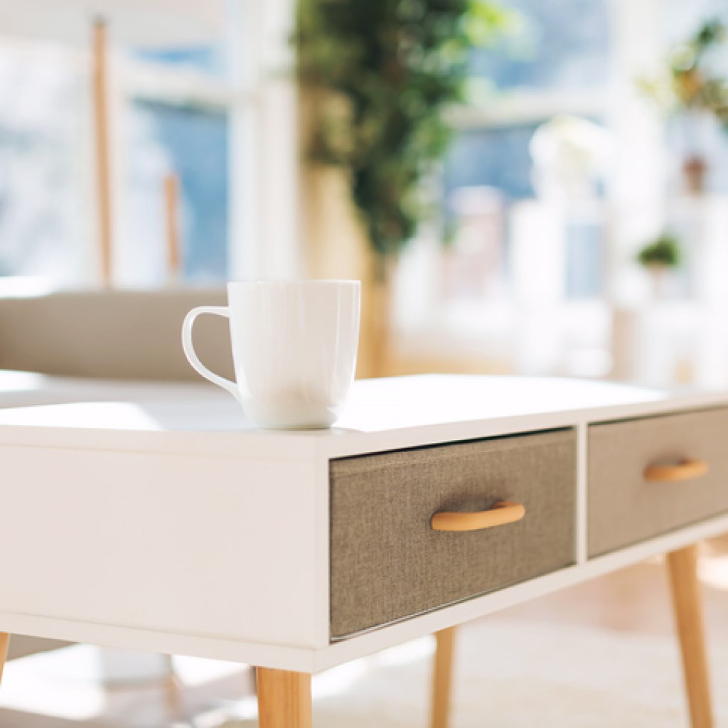 Table with coffee cup on it