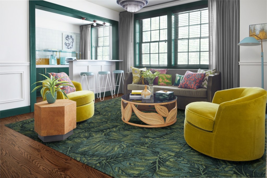 green maximalism styled room with yellow chairs by FLOR