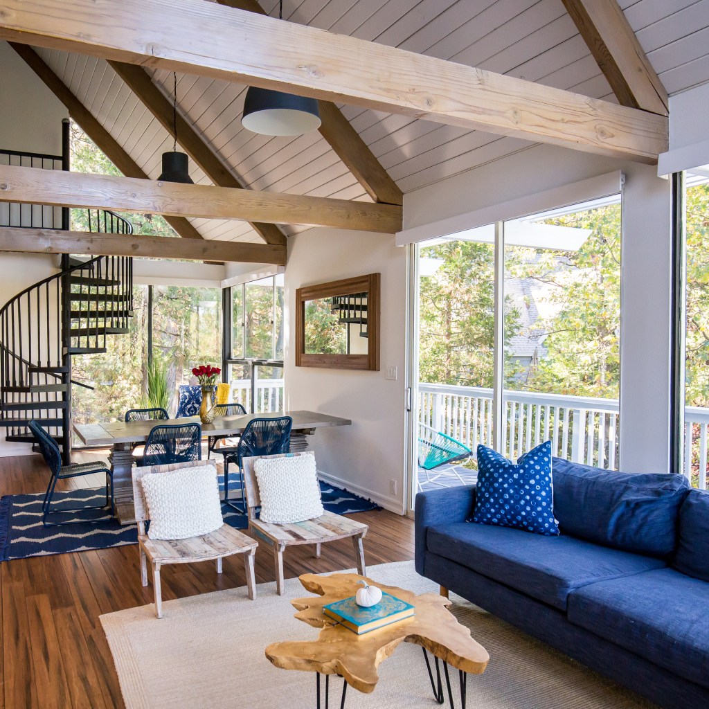 Modern farmhouse living room with a blue sofa