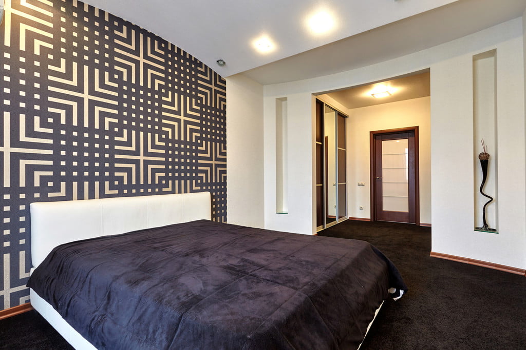 feature geometric wall in bedroom