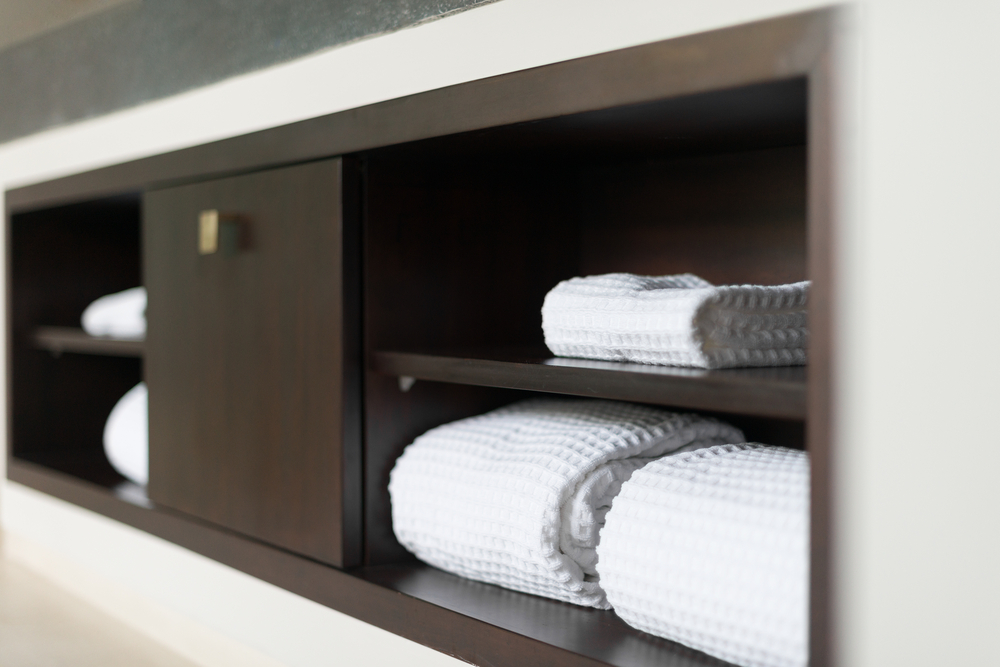 Bathroom shelves with towels