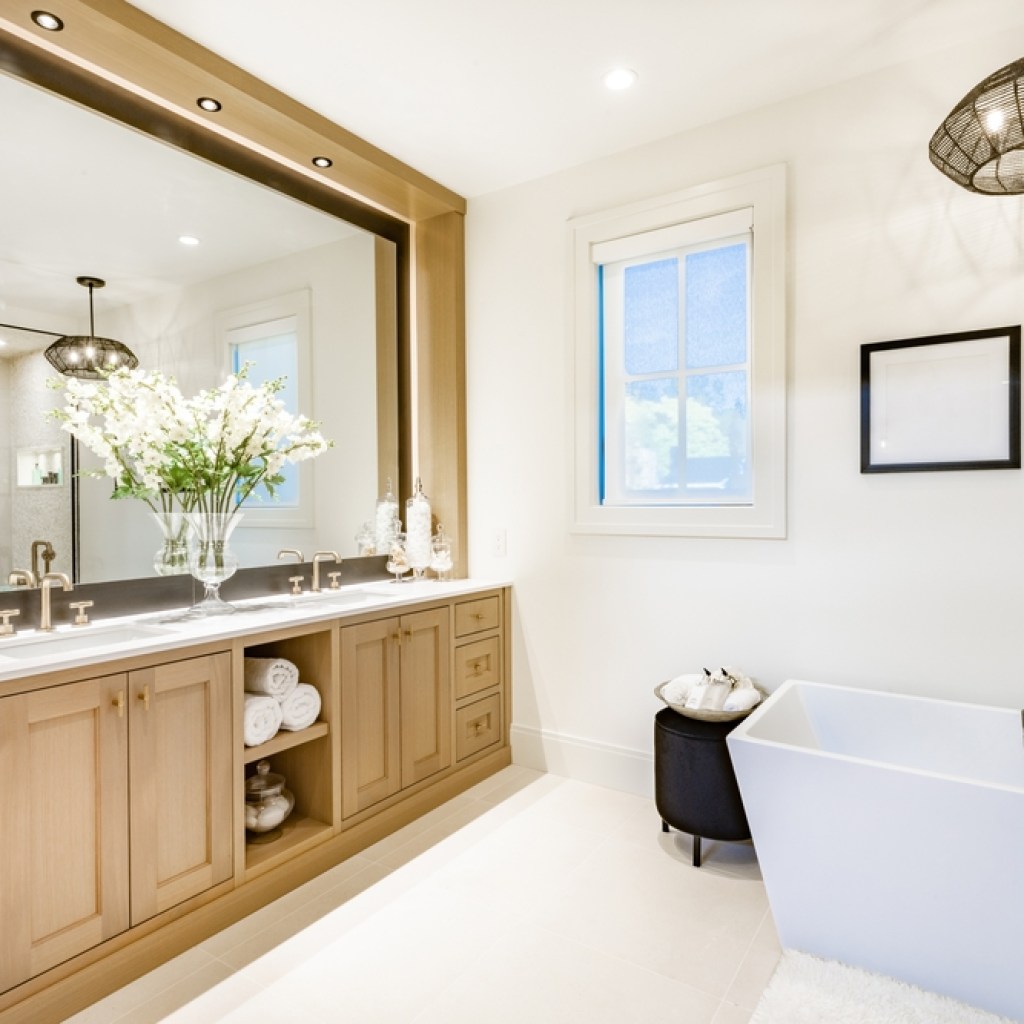 Bathroom with tub and vanity