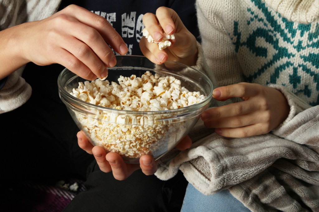 People eating popcorn