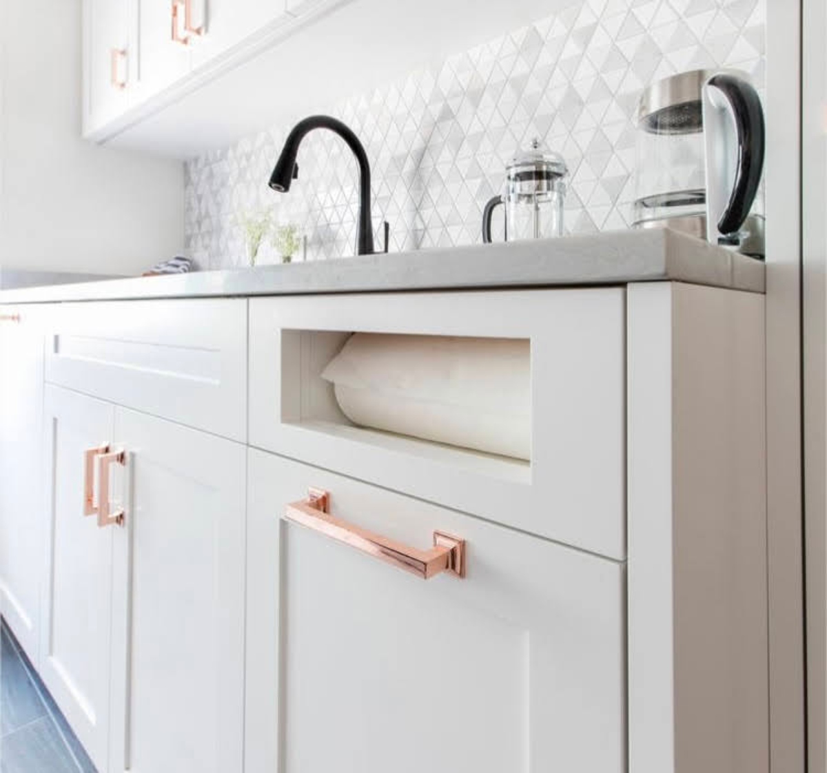 Hidden paper towel roll in cabinets