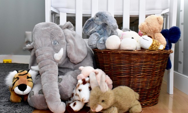 Toddler bedroom with baske of stuffed toys