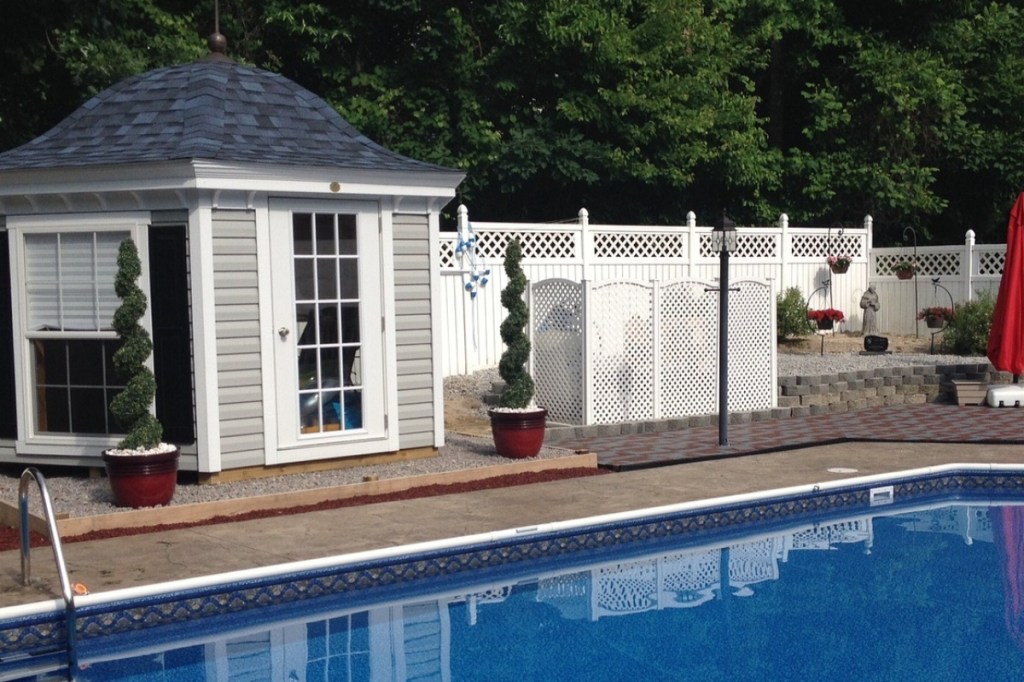 Backyard with swimming pool and pool house