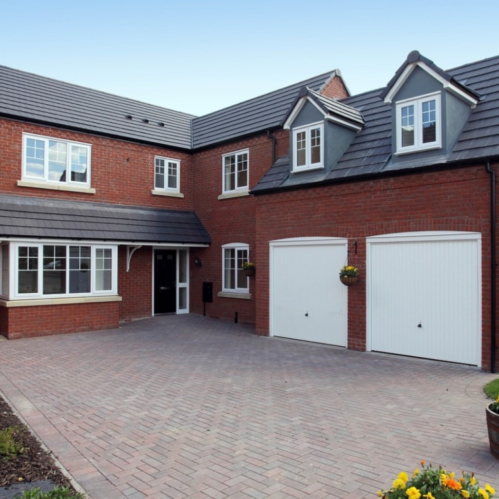 Brick house with brick paver driveway
