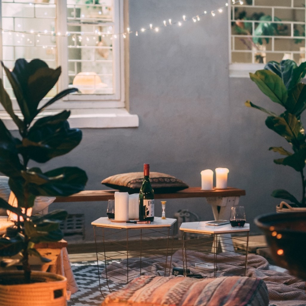 Small outdoor cozy patio with soft lighting