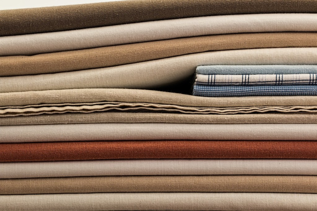 neatly folded and stacked linens