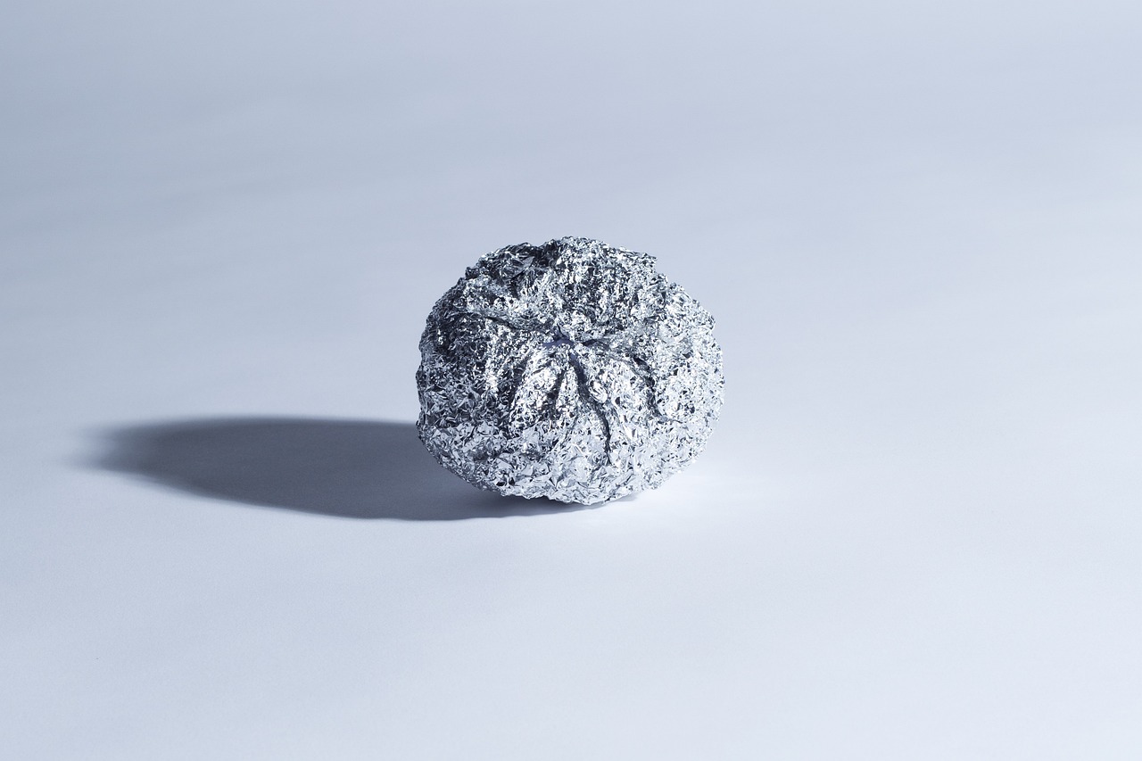 aluminum foil ball on white surface