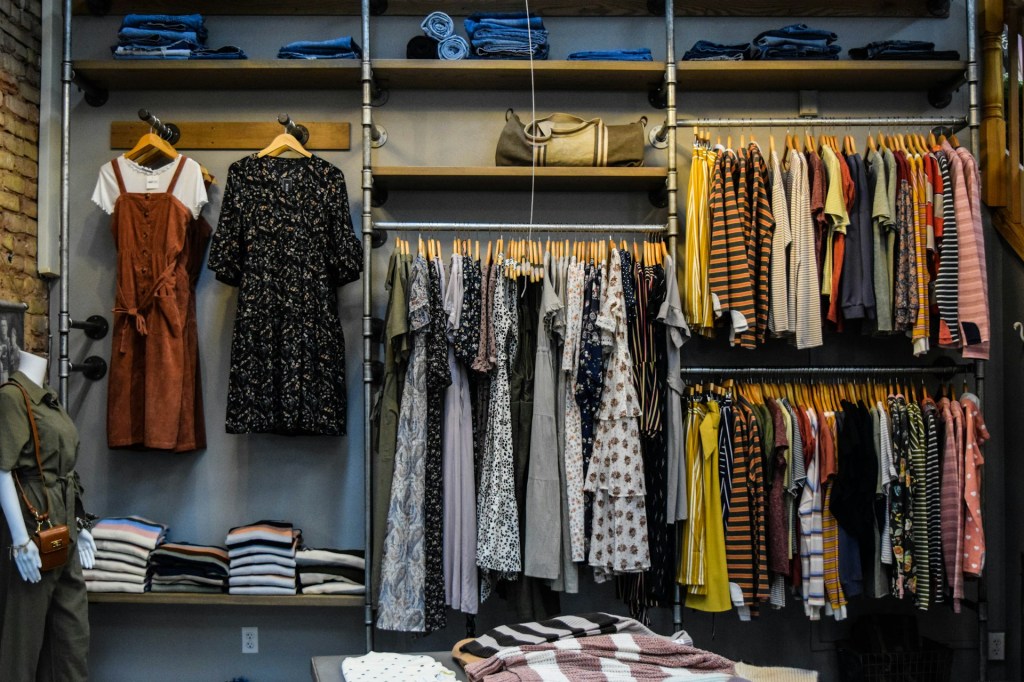 full shelves and rods in a large closet