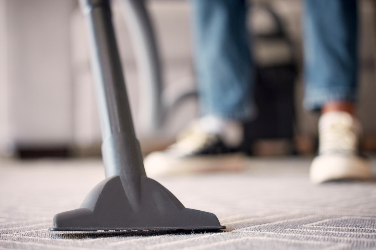 Person vacuuming