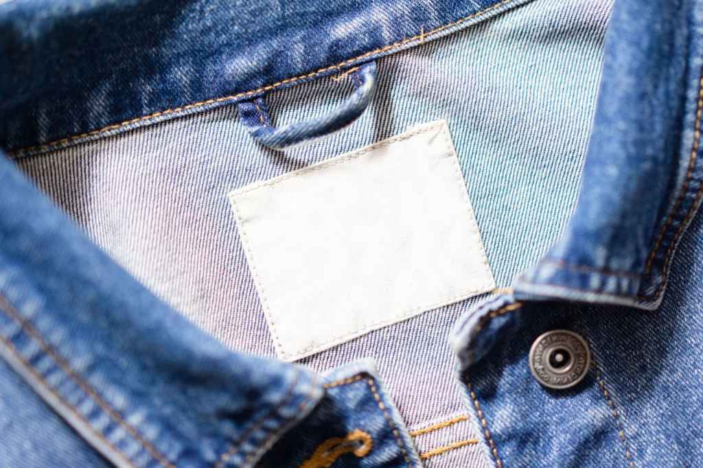 garment tag on denim jacket
